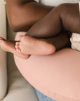 snuggle me organic feeding and support pillow for mom and baby breastfeeding