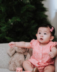 baby elsie wearing purebaby organic festive bodysuit christmas collection organic cotton baby clothes