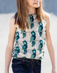 teen girl in maxomorra kids parrot tank top sleeveless