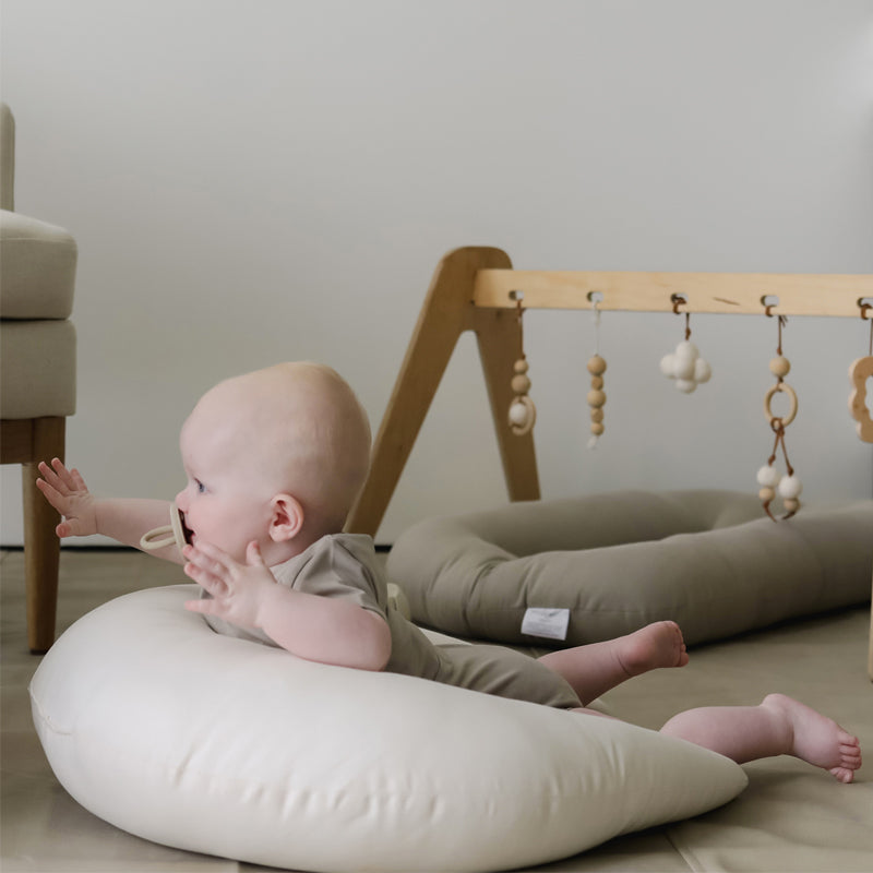 baby tummy time on snuggle me organic feeding support pillow