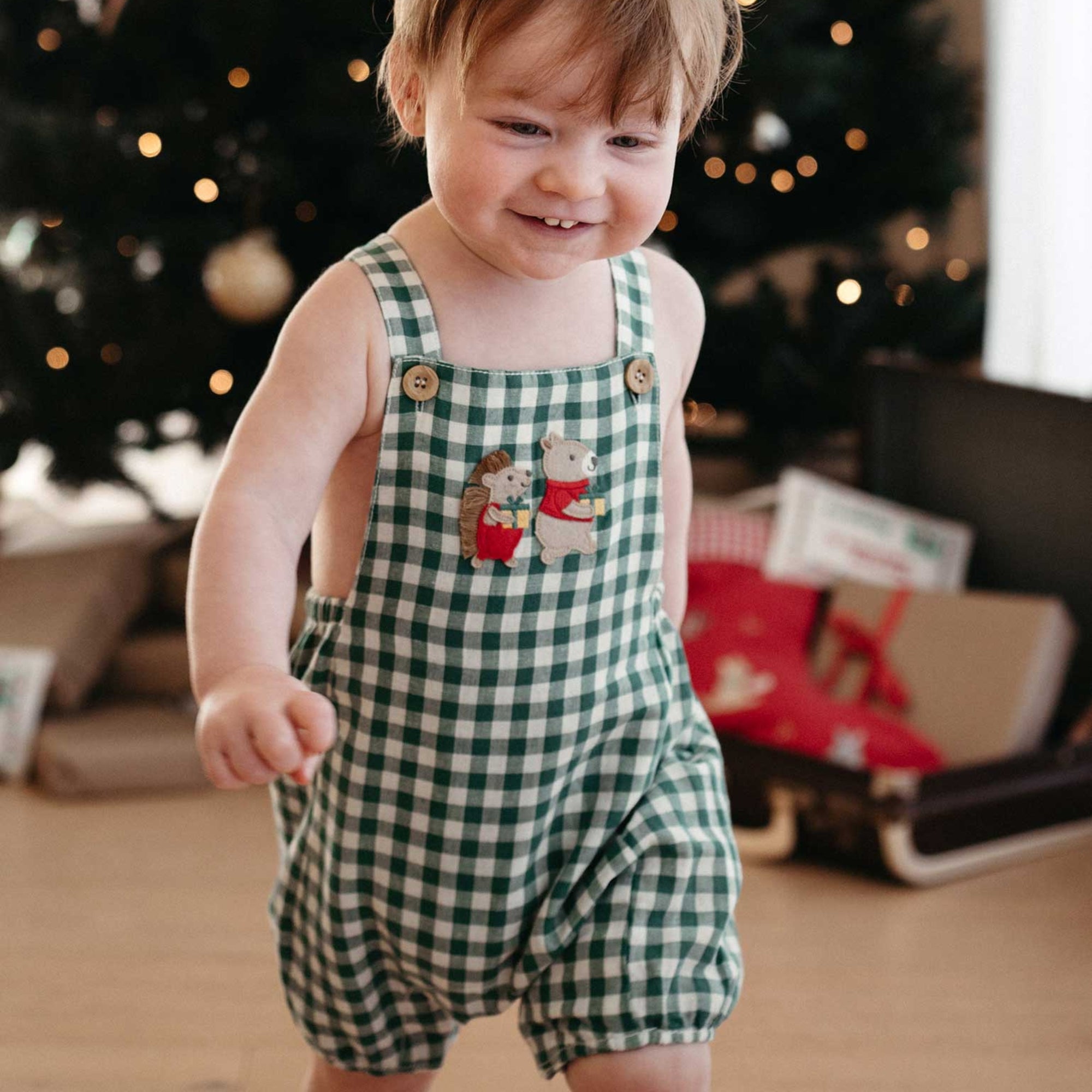 baby kids in purebaby christmas festive gingham overall coriander baby christmas outfit