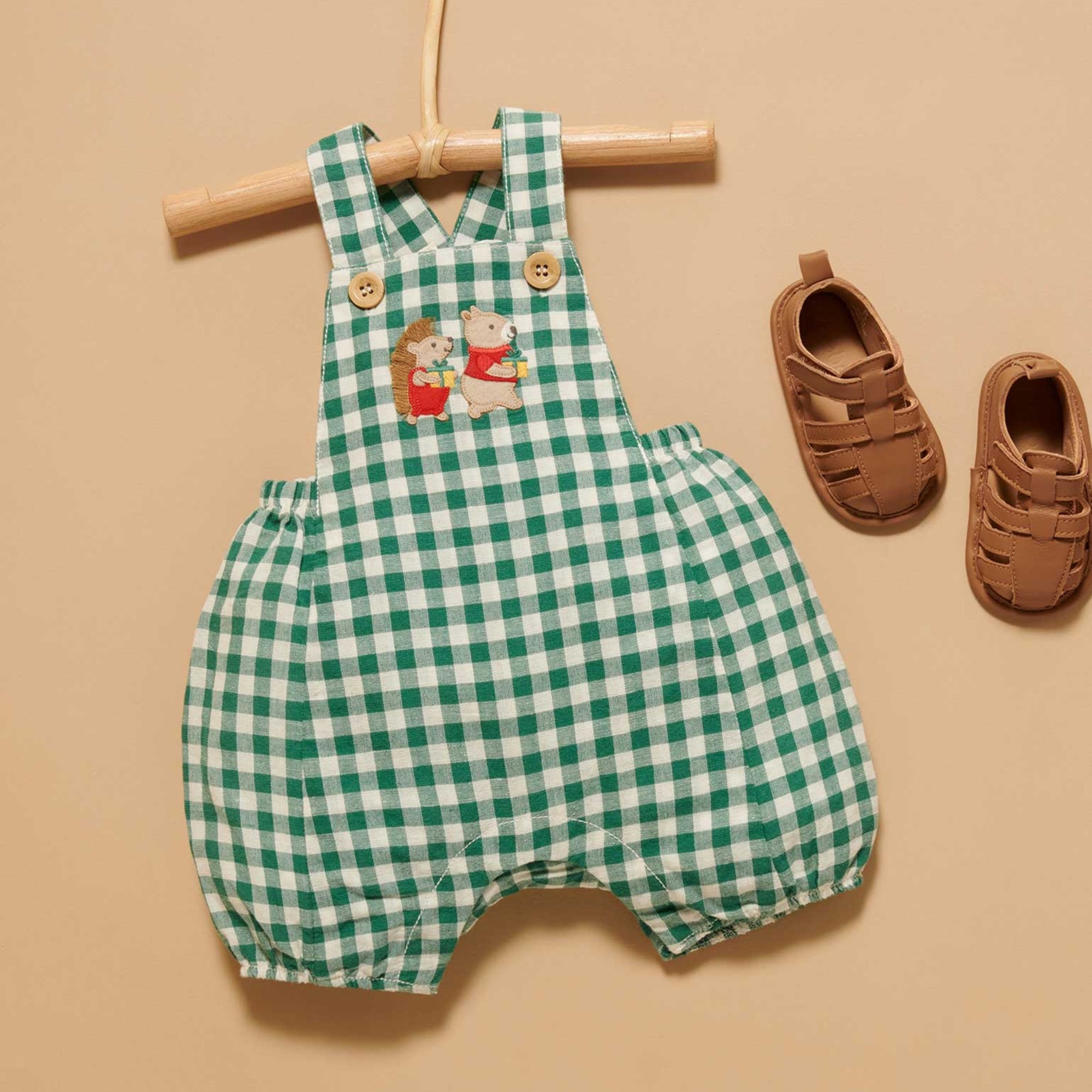 baby kids in purebaby christmas festive gingham overall coriander baby christmas outfit