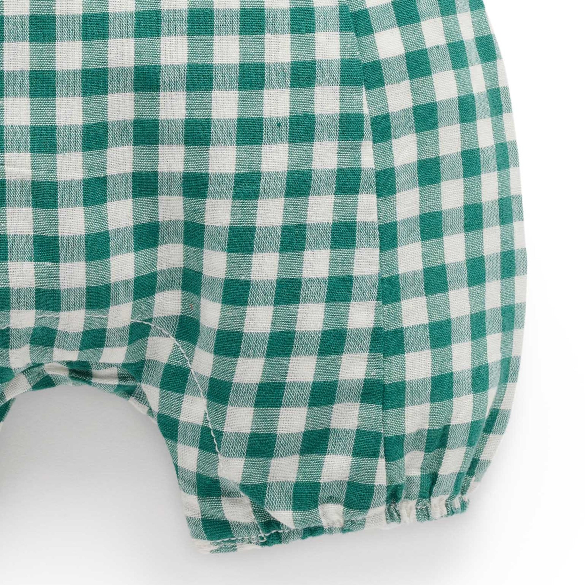 baby kids in purebaby christmas festive gingham overall coriander baby christmas outfit