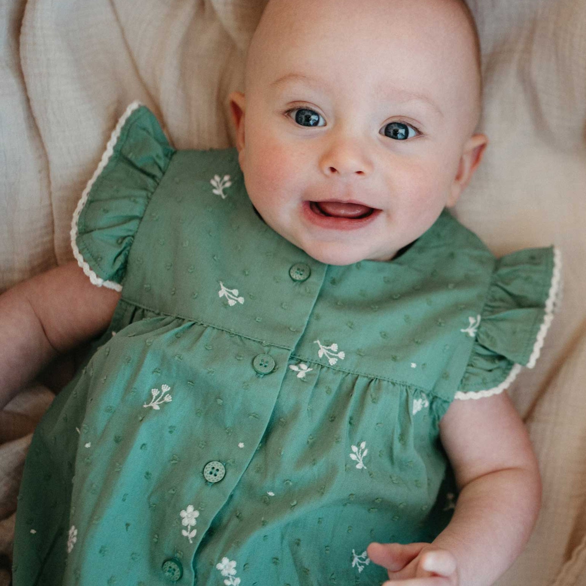 baby wearing purebaby organic festive embroidered bodysuit baby christmas outfit