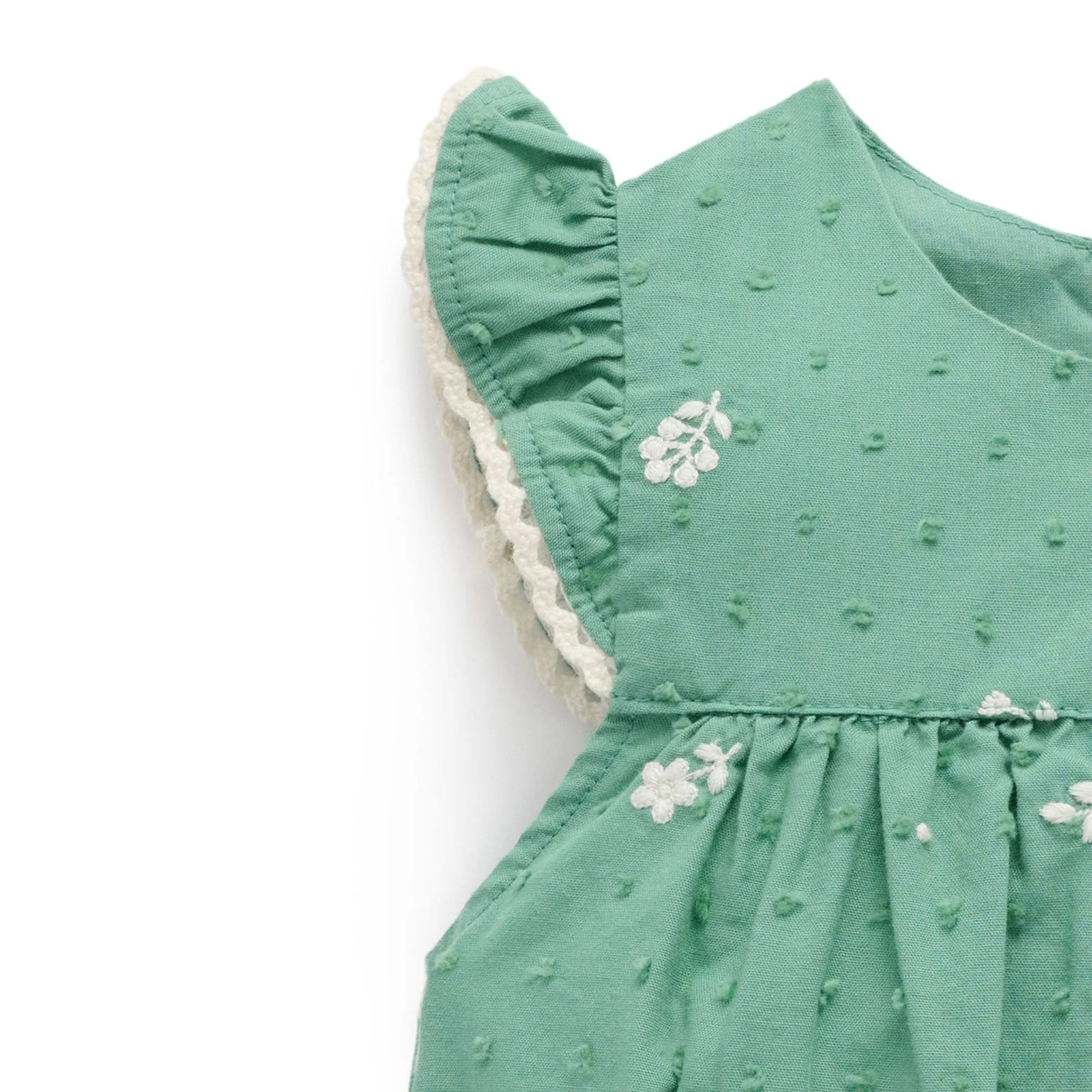 baby wearing purebaby organic festive embroidered bodysuit baby christmas outfit