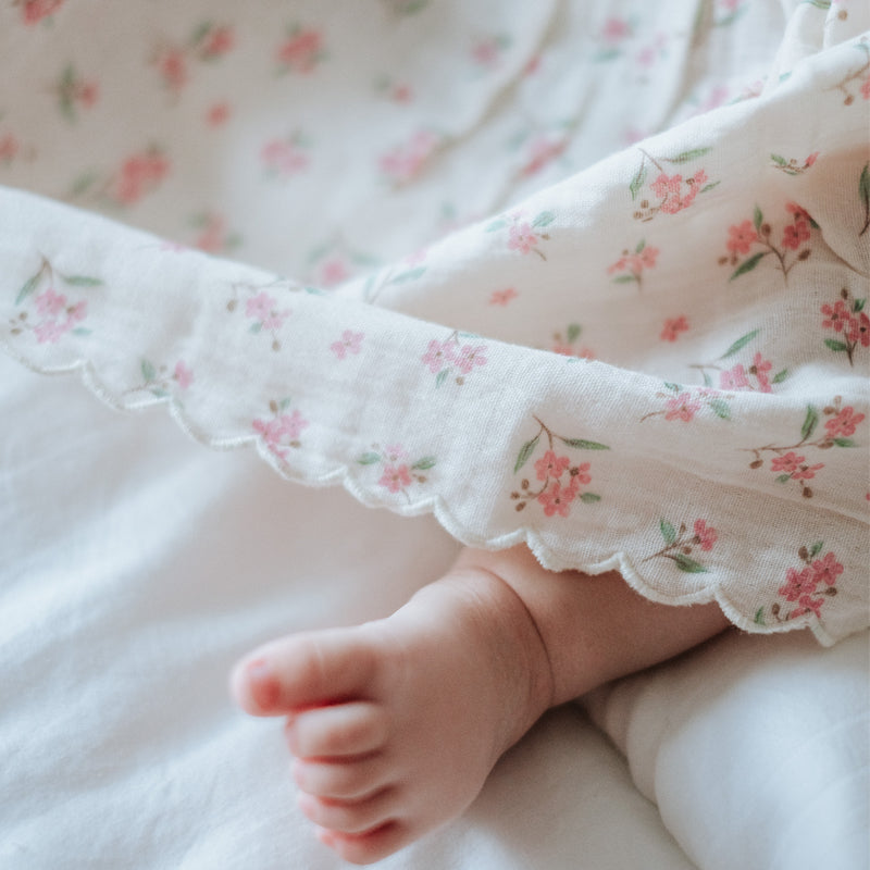 baby elsie wearing purebaby organic armeria bow dress organic cotton baby clothes