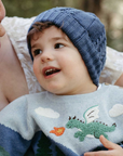 purebaby organic blue knit beanie with pom pom kids travel winter