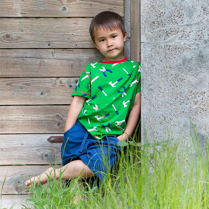 boy in maxomorra tools green short sleeve top